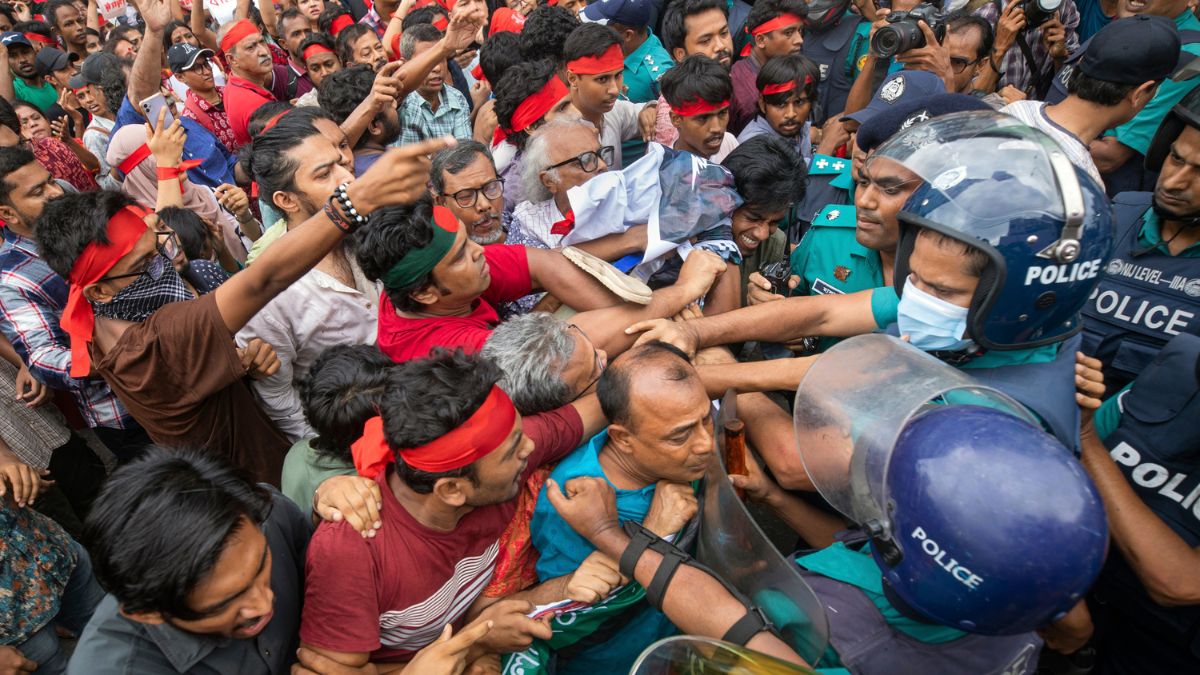 Activists clash with the police during a march to remember victims of recent countrywide clashes, in Dhaka, Bangladesh. AP Activists clash with the police during a march to remember victims of recent countrywide clashes, in Dhaka, Bangladesh. AP