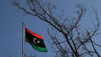 A Libyan flag flutters atop the Libyan Consulate in Athens. Image used for representative purpose