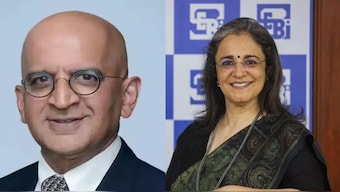 Dhaval Buch (left), his wife and SEBI chief, Madhabi Puri. File Photos