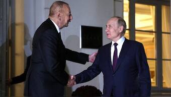 Russia's President Vladimir Putin shakes hands with Azerbaijan's President Ilham Aliyev after trilateral meeting with Armenia's Prime Minister Nikol Pashinyan in Sochi, Russia October 31, 2022. Reuters/File Photo