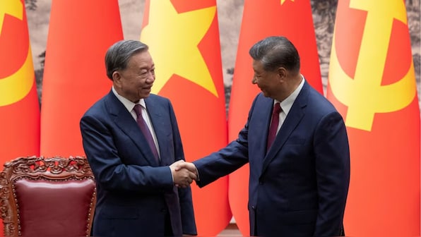 Rails to crocodiles, China and Vietnam sign 14 deals after Xi Jinping meets To Lam