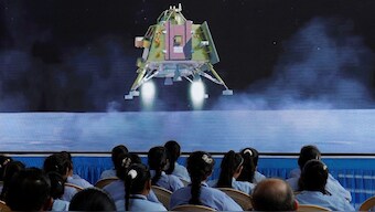 People watch a live stream of Chandrayaan-3 spacecraft's landing on the moon, inside an auditorium of Gujarat Science City in Ahmedabad, Gujarat, August 23, 2023. File Photo/Reuters