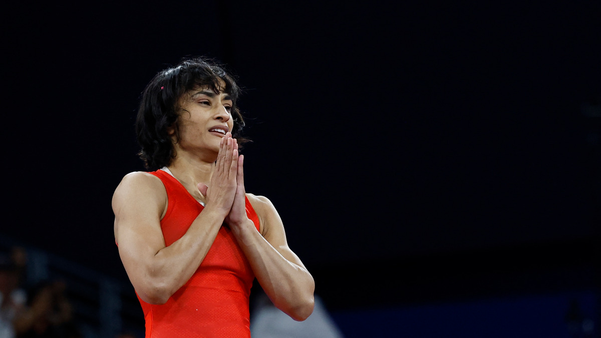 India's Vinesh Phogat celebrates after defeating Cuba's Yusneylys Guzman in the women's 50kg semi-finals at the Paris Olympics. Reuters India's Vinesh Phogat celebrates after defeating Cuba's Yusneylys Guzman in the women's 50kg semi-finals at the Paris Olympics. Reuters