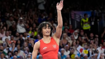 India's Vinesh Phogat reacts after defeating Cuba's Yusneylys Guzman to advance to the women's 50kg final in the Paris Olympics. AP