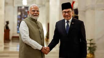 Malaysia's digital payment market has emerged as a fertile ground for fintech innovation, which has attracted several Indian startups to the region. PM Modi, with PM Anwar. Image Credit: Reuters