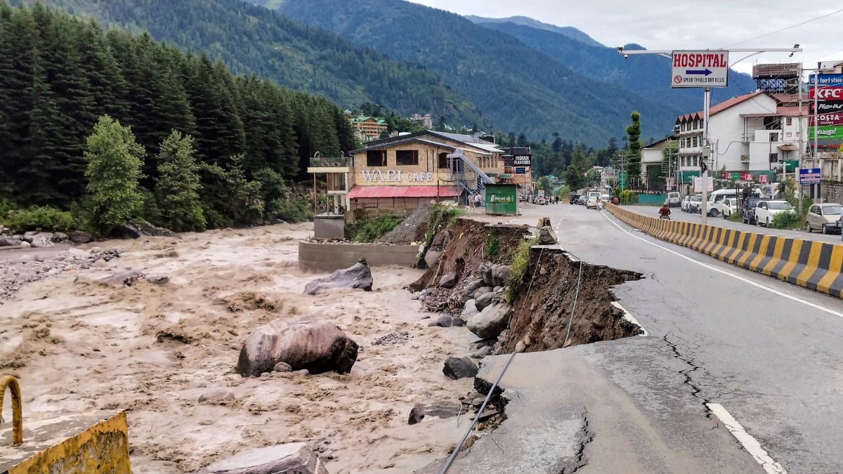 The partially washed-away Manali-Chandigarh highway is seen alongside a swollen Beas River at Manali, following a recent cloudburst in Kullu district. PTI The partially washed-away Manali-Chandigarh highway is seen alongside a swollen Beas River at Manali, following a recent cloudburst in Kullu district. PTI