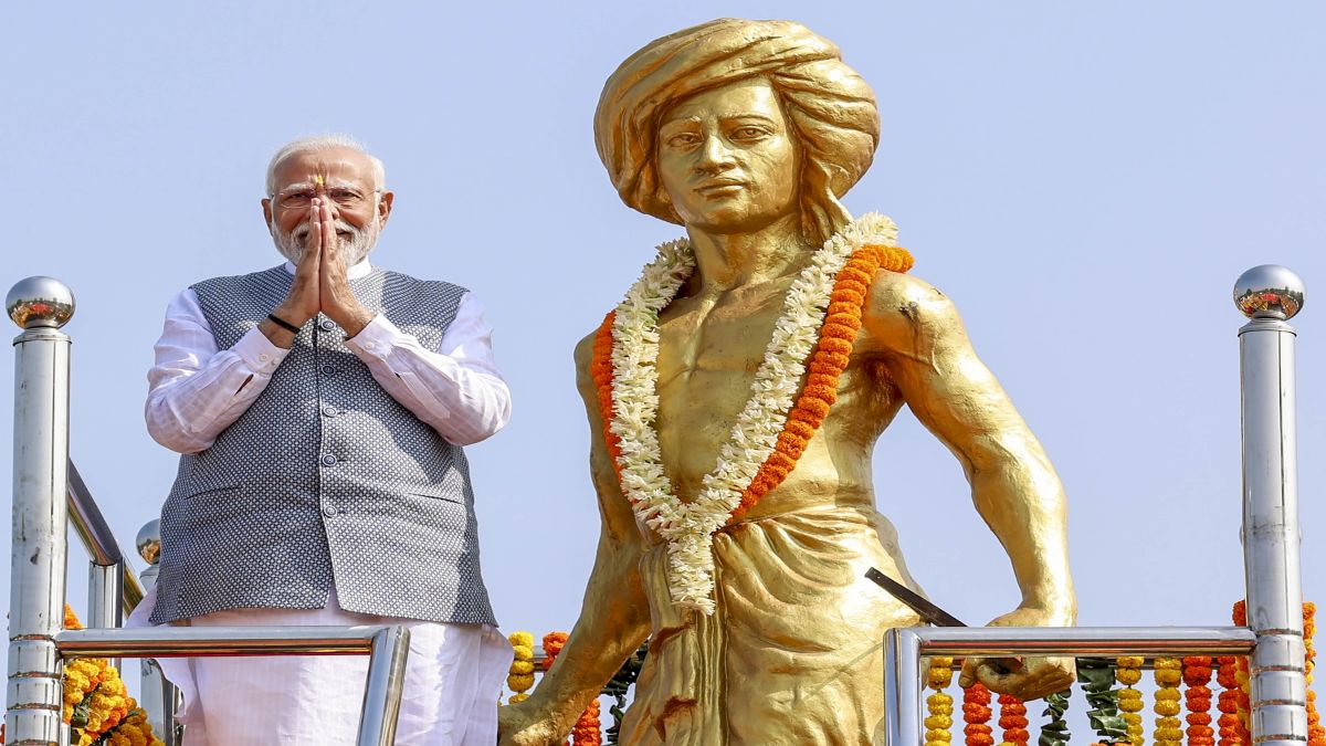 (File) Prime Minister Narendra Modi pays floral tribute to tribal icon Birsa Munda at his ancestral home in Ulihatu, in Khunti, Jharkhand. In his 11th Independence Day speech, PM Modi honoured the tribal hero, Birsa Munda. PTI (File) Prime Minister Narendra Modi pays floral tribute to tribal icon Birsa Munda at his ancestral home in Ulihatu, in Khunti, Jharkhand. In his 11th Independence Day speech, PM Modi honoured the tribal hero, Birsa Munda. PTI