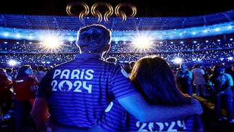 Athletes and the Olympic rings during the closing ceremony at the Paris 2024 Olympics. Reuters