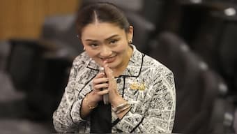 Leader of Pheu Thai Party, Paetongtarn Shinawatra, daughter of Thailand's former Prime Minister Thaksin Shinawatra, smiles before press conference in Bangkok, Thailand. The Pheu Thai Party declared their support for her on August 15. AP