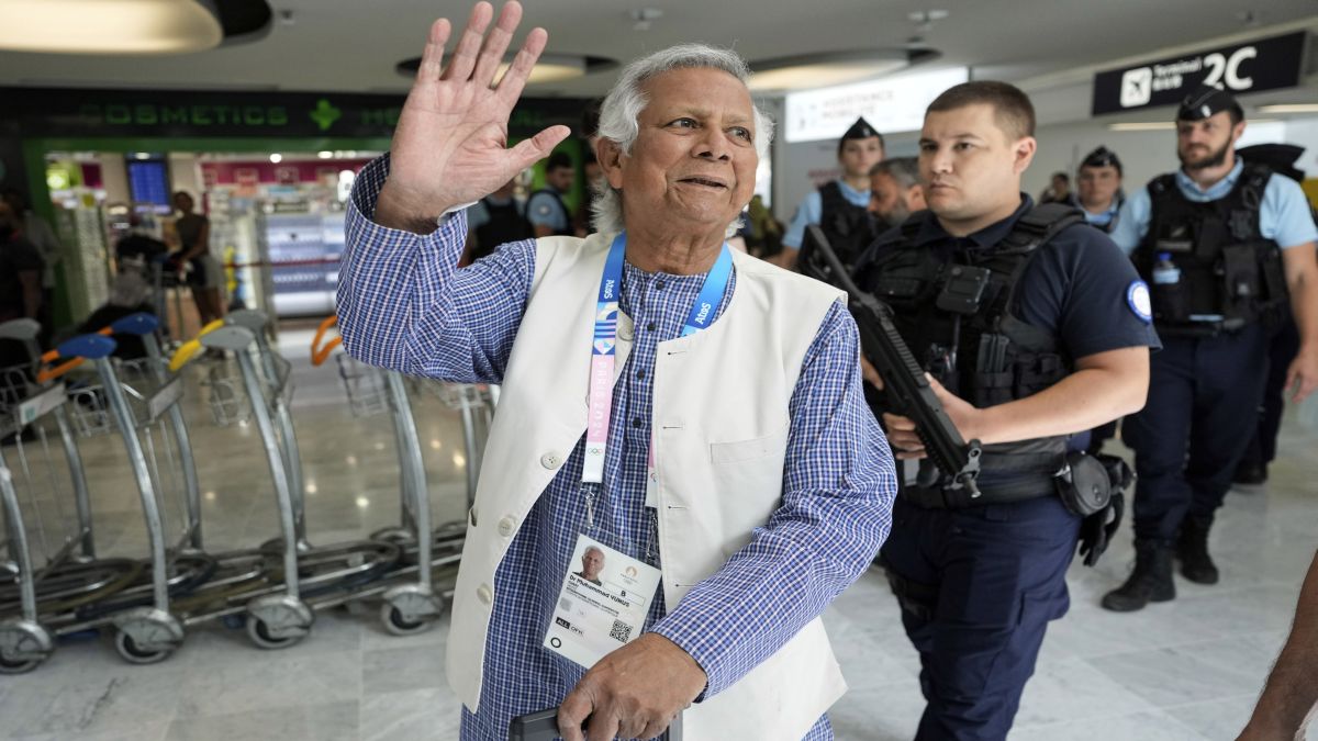 Nobel laureate Muhammad Yunus waves to the media at Charles de Gaulle's airport in Roissy, north of Paris, before making his way to Bangladesh where he was sworn in as interim chief. AP Nobel laureate Muhammad Yunus waves to the media at Charles de Gaulle's airport in Roissy, north of Paris, before making his way to Bangladesh where he was sworn in as interim chief. AP