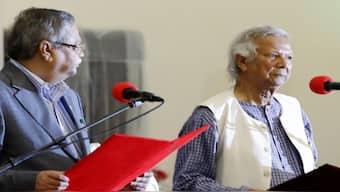 Bangladesh's figurehead President Mohammed Shahabuddin administers the oath of office to Nobel laureate Muhammad Yunus, as the head of Bangladesh's interim government, in Dhaka, Bangladesh. AP