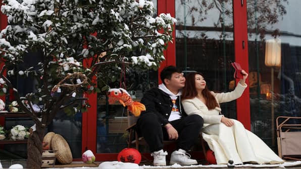 How Chinese divorcees are paying big bucks to get their wedding photos shredded