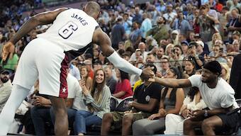 LeBron James and son Bronny during a match at Paris Olympics. Reuters