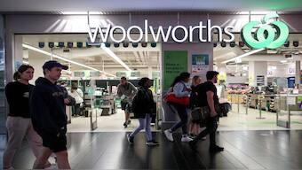 People walk past a Woolworths supermarket in Sydney, Australia. File image/ Reuters