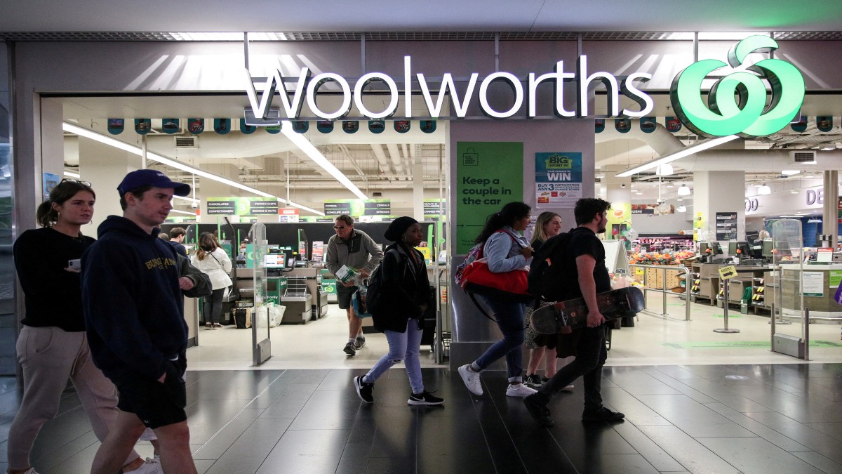 People walk past a Woolworths supermarket in Sydney, Australia. File image/ Reuters People walk past a Woolworths supermarket in Sydney, Australia. File image/ Reuters