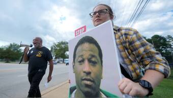 The Rev Hillary Taylor on Friday protests against the execution of Freddie Owens. AP