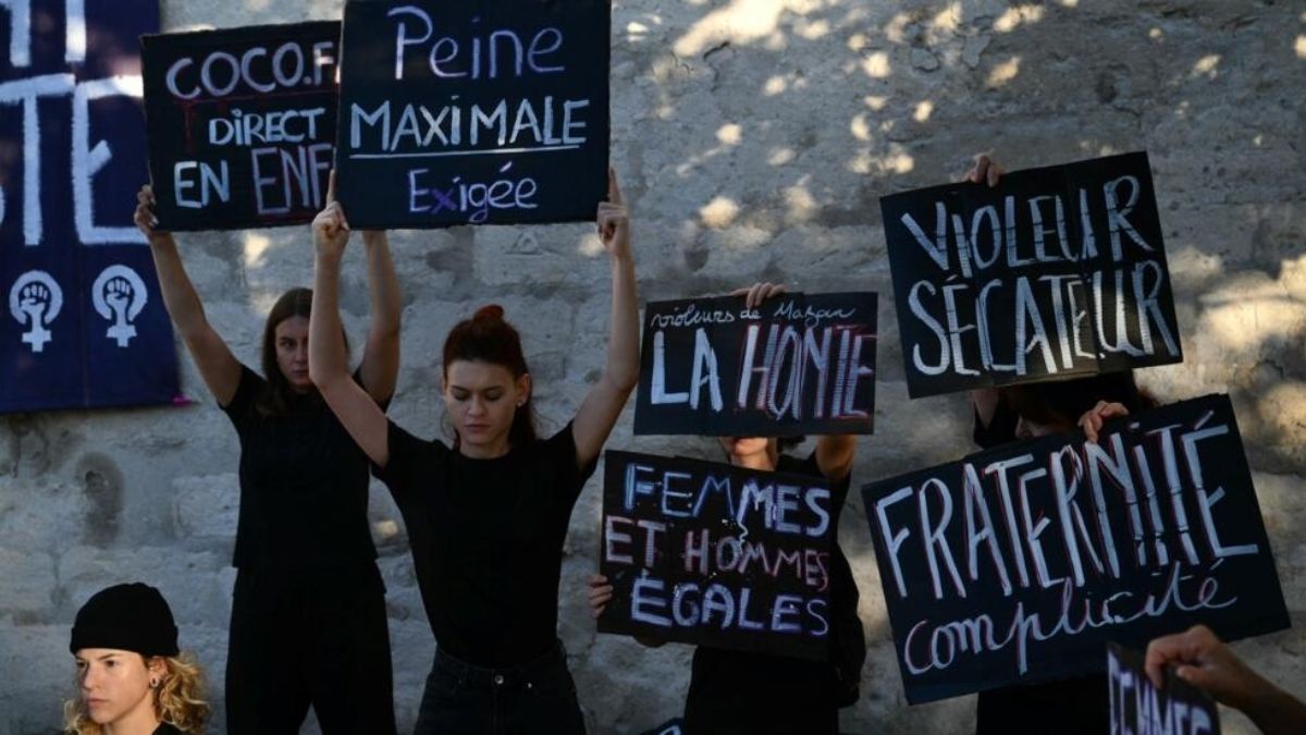 Demonstrators hold placards during a protest outside the courthouse during the trial of a man accused of drugging his wife for nearly ten years and inviting strangers to rape her at their home in Mazan, a small town in the south of France, in Avignon. AFP Demonstrators hold placards during a protest outside the courthouse during the trial of a man accused of drugging his wife for nearly ten years and inviting strangers to rape her at their home in Mazan, a small town in the south of France, in Avignon. AFP