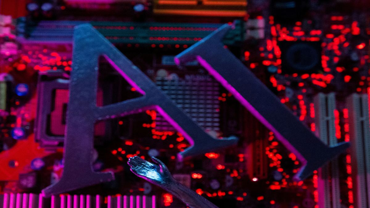 AI (Artificial Intelligence) letters and robot hand are placed on computer motherboard in this illustration. Image courtesy: Reuters AI (Artificial Intelligence) letters and robot hand are placed on computer motherboard in this illustration. Image courtesy: Reuters