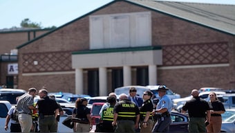 Police gather outside Apalachee High School after a shooting at the school Wednesday, Sept. 4, 2024, in Winder, Georgia. AP