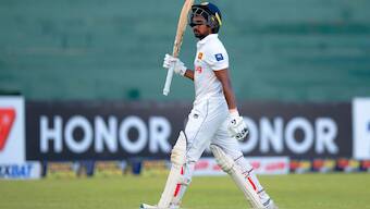 Sri Lanka's Kamindu Mendis leaves the field after losing his wicket to New Zealand's Ajaz Patel on Day 1 of the first Test in Galle on Wednesday. AP 