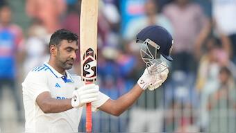 R Ashwin celebrates scoring his century on Day 1 of the first Test between India and Bangladesh in Chennai. AP 
