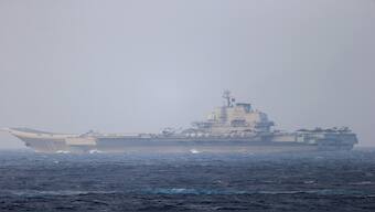 Chinese aircraft carrier Liaoning sails through the Miyako Strait near Okinawa on its way to the Pacific in this handout photo taken by Japan Self-Defense Forces and released by the Joint Staff Office of the Defense Ministry of Japan on April 4, 2021. Reuters