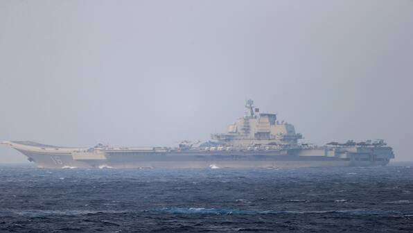 'No need to over-interpret': China says aircraft carrier accused of intrusion was on routine training