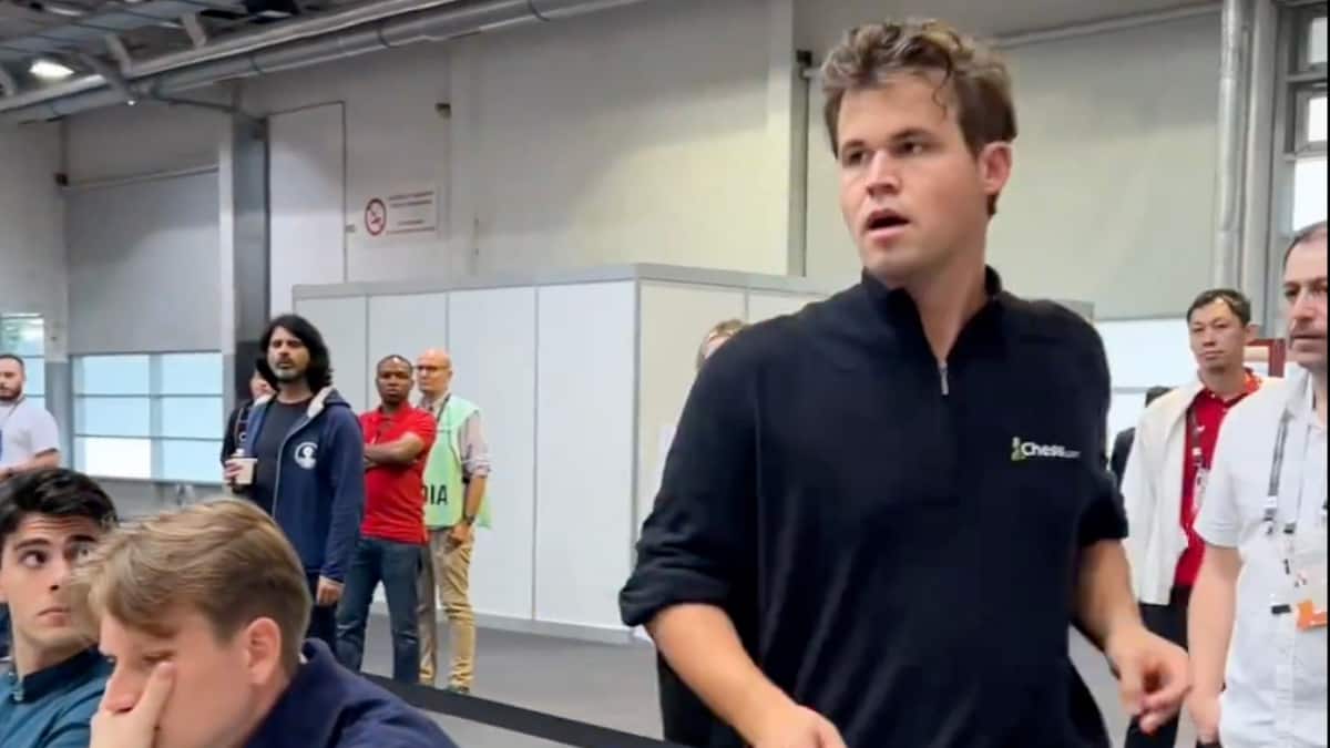 Chess Olympiad: Magnus Carlsen bikes to venue, almost forfeits, saved by photographer