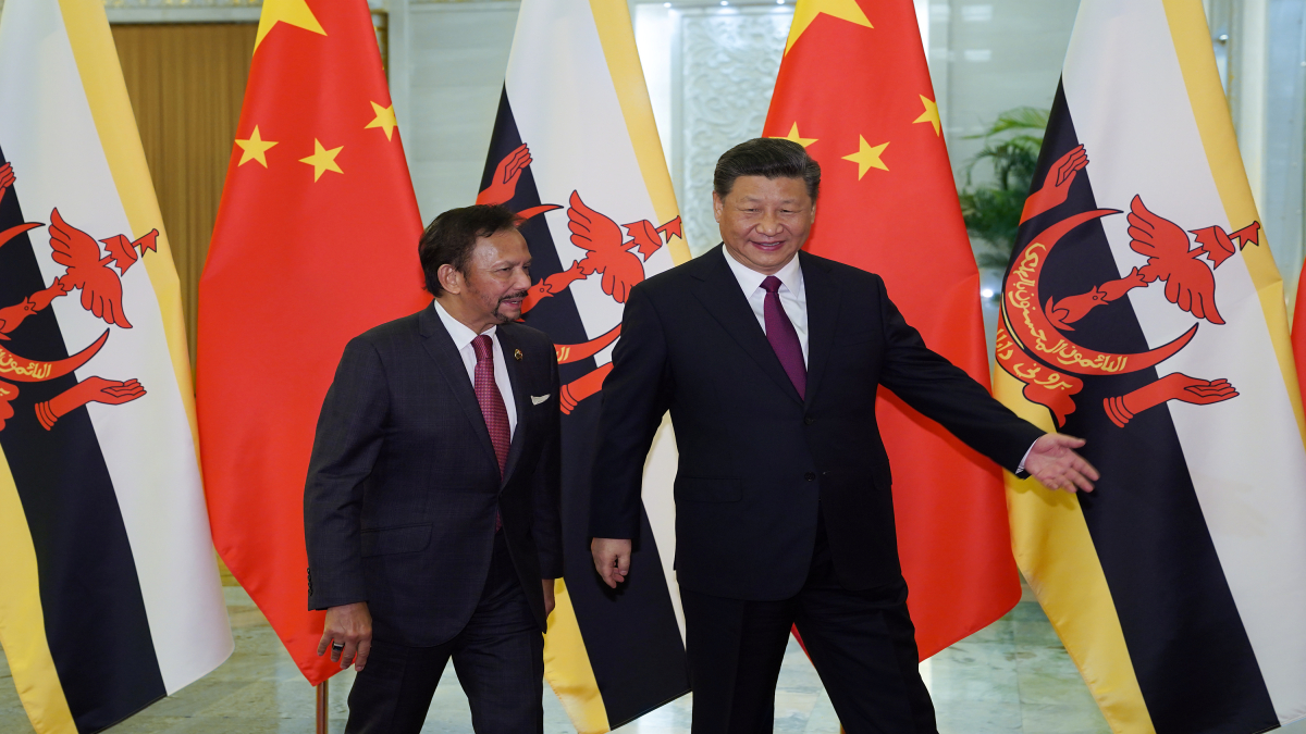 Chinese President Xi Jinping shows the way to the meeting room to Brunei's Sultan Hassanal Bolkiah during their meeting in 2019. Image courtesy: Reuters Chinese President Xi Jinping shows the way to the meeting room to Brunei's Sultan Hassanal Bolkiah during their meeting in 2019. Image courtesy: Reuters