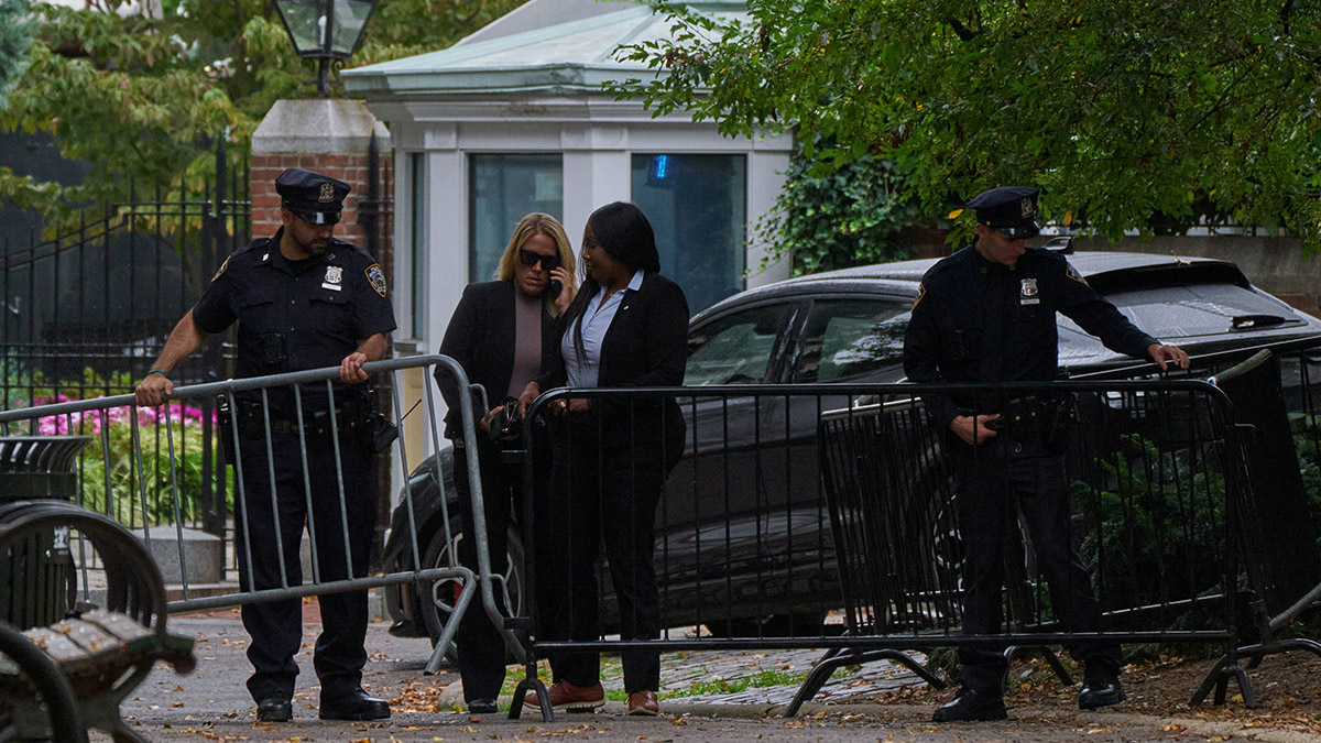 NYPD officers open barricades for supporters of New York City Mayor Eric Adams (not pictured) to depart Gracie Mansion, his official residence, before the announcement that Adams was charged with bribery and illegally soliciting a campaign contribution from a foreign national, in New York City, US., September 26, 2024. Reuters NYPD officers open barricades for supporters of New York City Mayor Eric Adams (not pictured) to depart Gracie Mansion, his official residence, before the announcement that Adams was charged with bribery and illegally soliciting a campaign contribution from a foreign national, in New York City, US., September 26, 2024. Reuters