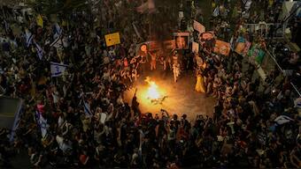 People protest against Prime Minister Benjamin Netanyahu's government and call for the release of hostages held in the Gaza Strip by the Hamas militant group, in Tel Aviv, Israel, Saturday, Sept. 21, 2024. - AP