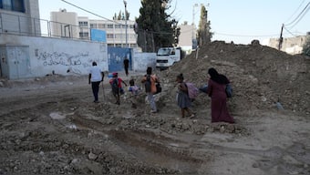 Palestinian refugees flee the West Bank refugee camp of Tulkarem, during an Israeli army operation in Tulkarem, Thursday, Sept. 12, 2024. - Iamge- AP