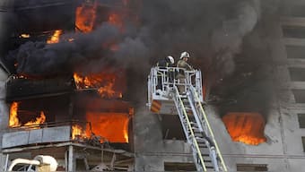 Firefighters tackle a blaze after a Russian aerial bomb struck a multi-story residential building in Kharkiv, Ukraine, Sunday Sept. 15, 2024.- AP