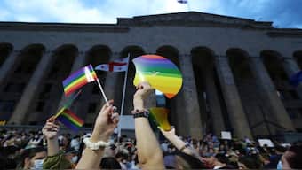 Participants hold rainbow flags in Tbilisi, Georgia on July 6, 2021. Reuters File