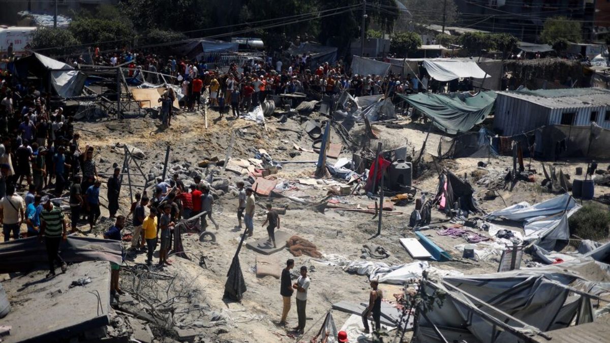 Palestinians inspect the damage, following an Israeli strike at a tent camp in Al-Mawasi area, amid Israel-Hamas conflict, in Khan Younis in the southern Gaza Strip July 13, 2024. Reuters Palestinians inspect the damage, following an Israeli strike at a tent camp in Al-Mawasi area, amid Israel-Hamas conflict, in Khan Younis in the southern Gaza Strip July 13, 2024. Reuters