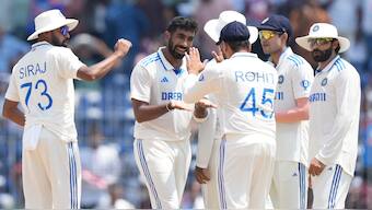 Indian team celebrates a wicket on the second day of the first Test in Chennai. AP