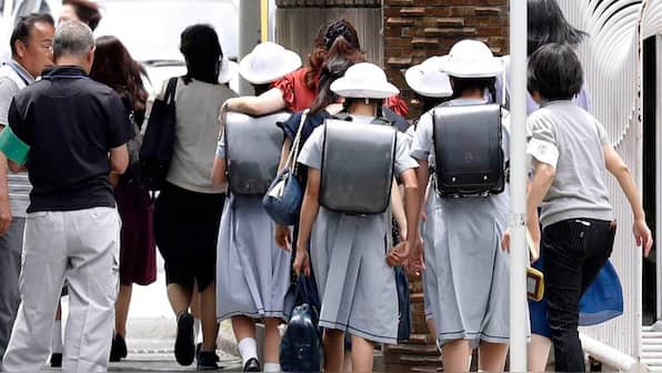 Shirts off! The growing backlash against Japan's topless health checkups in schools