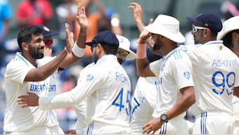 India pacer Jasprit Bumrah celebrates with teammates after dismissing Bangladesh wicketkeeper-batter Mushfiqur Rahim on Day 2 of the first Test in Chennai. AP