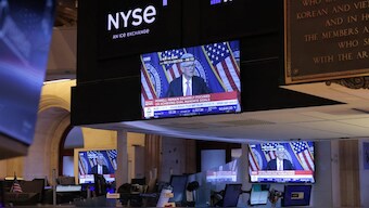 A screen on the trading floor at The New York Stock Exchange (NYSE) display a news conference with US Federal Reserve Chair Jerome Powell following the Federal Reserve rate announcement, in New York City, US, September 18, 2024. Reuters