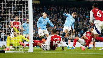 Manchester City defender John Stones scores the 98th minute equaliser against Arsenal in the Premier League meeting between the two clubs at the Etihad Stadium in Manchester on Sunday, 22 September. AP