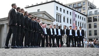 Players representing Team Europe and Team World as well as the two captains and their deputies pose with the winner's trophy in Berlin ahead of the seventh edition of the Laver Cup. Reuters