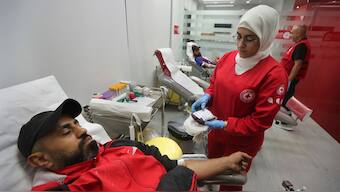 People donate blood for those who were injured by their exploded handheld pagers, at a Red Cross center, in the southern port city of Sidon, Lebanon, on September 17, 2024. AP