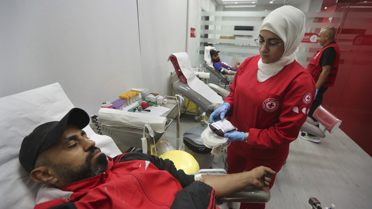 People donate blood for those who were injured by their exploded handheld pagers, at a Red Cross center, in the southern port city of Sidon, Lebanon, on September 17, 2024. AP People donate blood for those who were injured by their exploded handheld pagers, at a Red Cross center, in the southern port city of Sidon, Lebanon, on September 17, 2024. AP