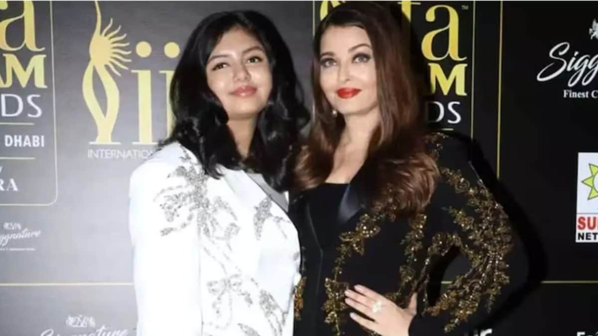 Amid divorce rumours with Abhishek Bachchan, Aishwarya Rai smiles as she returns to Mumbai with Aaradhya after 2024 IIFA Utsavam Awards, fans say, 'Even though she is a...' WATCH