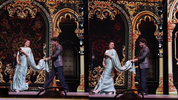 Shah Rukh Khan helps Rani Mukerji with her saree at IIFA stage, fans ...