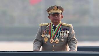 Gen. Min Aung Hlaing inspects officers during a parade to commemorate Myanmar's 78th Armed Forces Day in Naypyitaw, Myanmar, on March 27, 2023. AP File