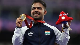 Navdeep Singh poses with the gold medal at the 2024 Paris Paralympics. Reuters 