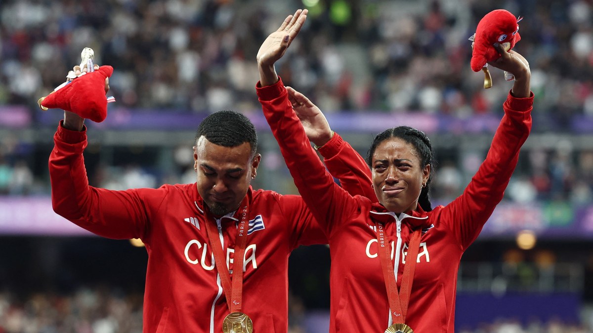 Visually impaired Cuban para-sprinter Omara Durand celebrates with her guide Yuniol Kindelan Vargas after winning gold in women's 200m in the T12 category in what would be the final race of her career. Reuters Visually impaired Cuban para-sprinter Omara Durand celebrates with her guide Yuniol Kindelan Vargas after winning gold in women's 200m in the T12 category in what would be the final race of her career. Reuters