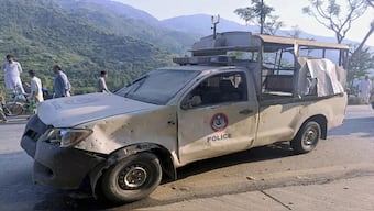 A police vehicle escorting a convoy of foreign diplomats was damaged in a fatal bomb explosion near Malam Jabba, Khyber Pakhtunkhwa, Pakistan, on September 22. AP  