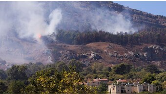Smoke and flames are visible near homes in Kiryat Shmona after a rocket attack launched from Lebanon, amid cross-border hostilities between Hezbollah and Israel, in northern Israel, September 26, 2024. - Reuters 